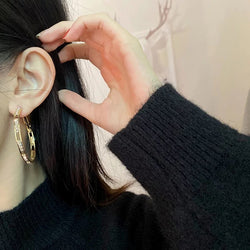 Hoop earrings with cubic zirconia stones